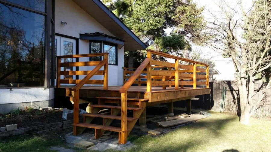 Wood deck with stairs and horizontal guardrails